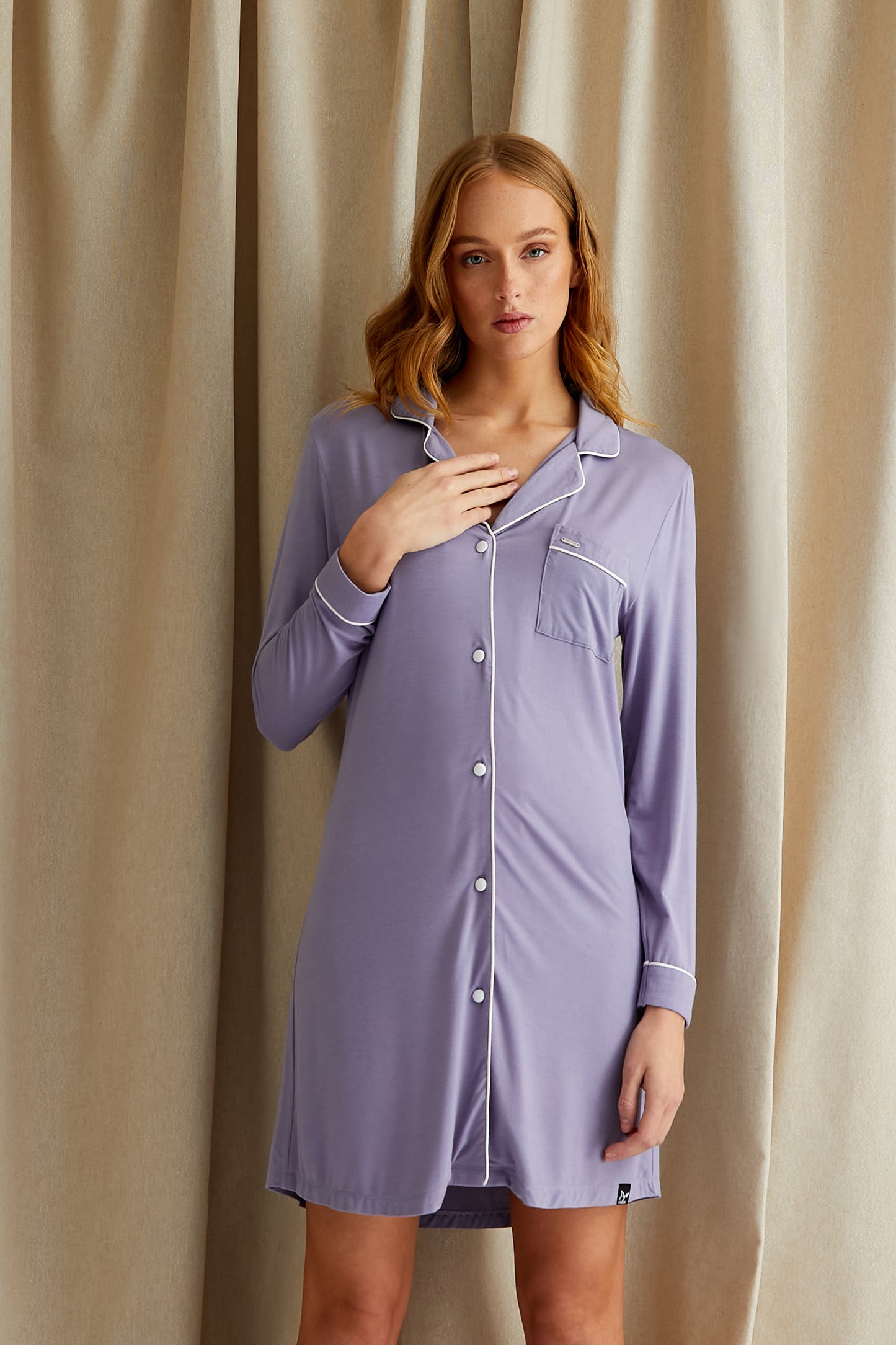 
                  
                    Women's Bamboo Nightshirt in Lavender with functional button up fastening, revere collar and contrast colour piping from Pretty You London
                  
                