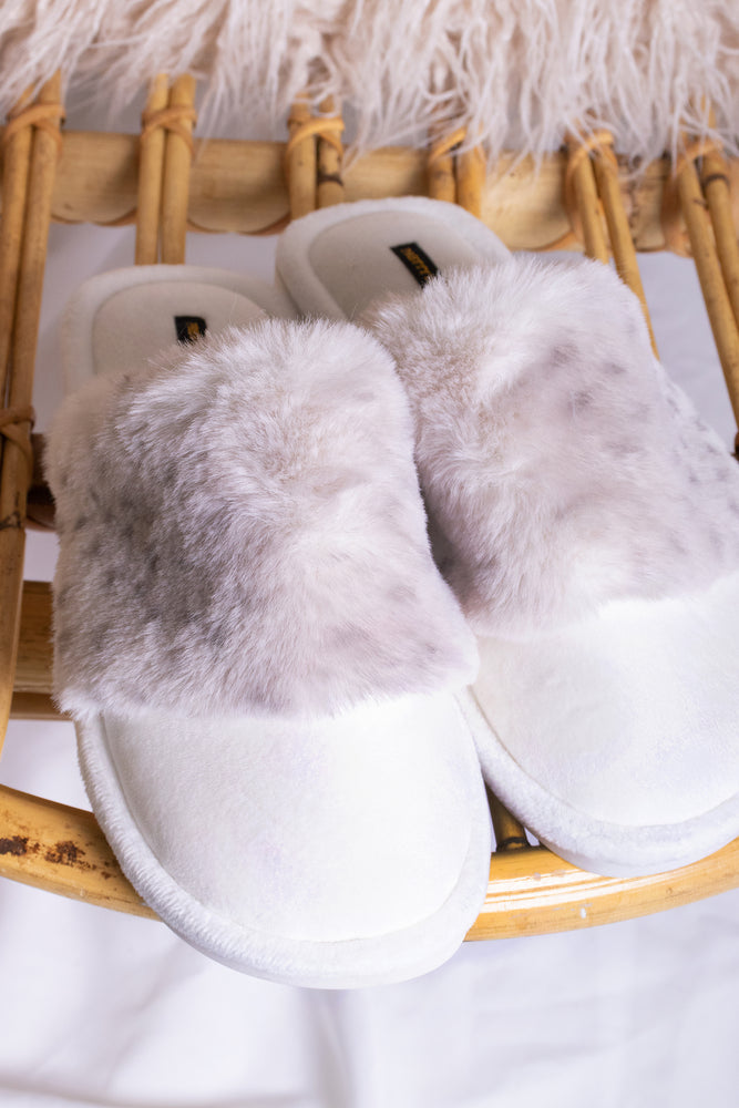 
                  
                    Danni women's mule slippers in snow leopard with super soft faux fur across a gentle velour upper from Pretty You London
                  
                