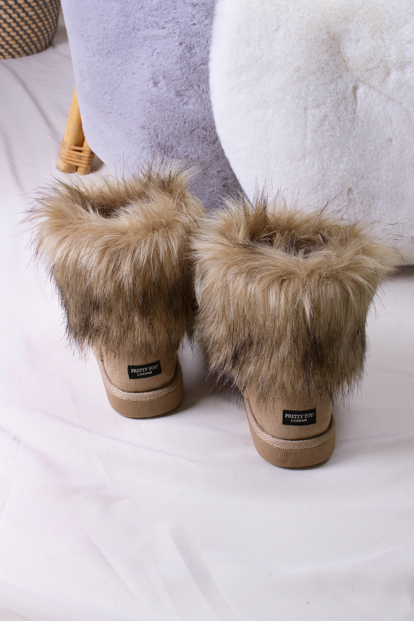 
                  
                    Elsa women's slipper booties in ecru with super comfy faux fur from Pretty You London
                  
                