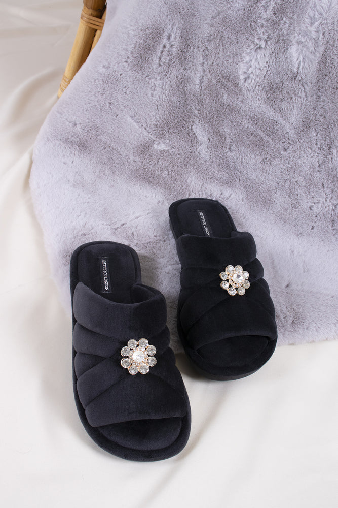 Faye women's slider slippers in raven combining brushed microfibre materials and a glimmering crystal brooch from Pretty You London