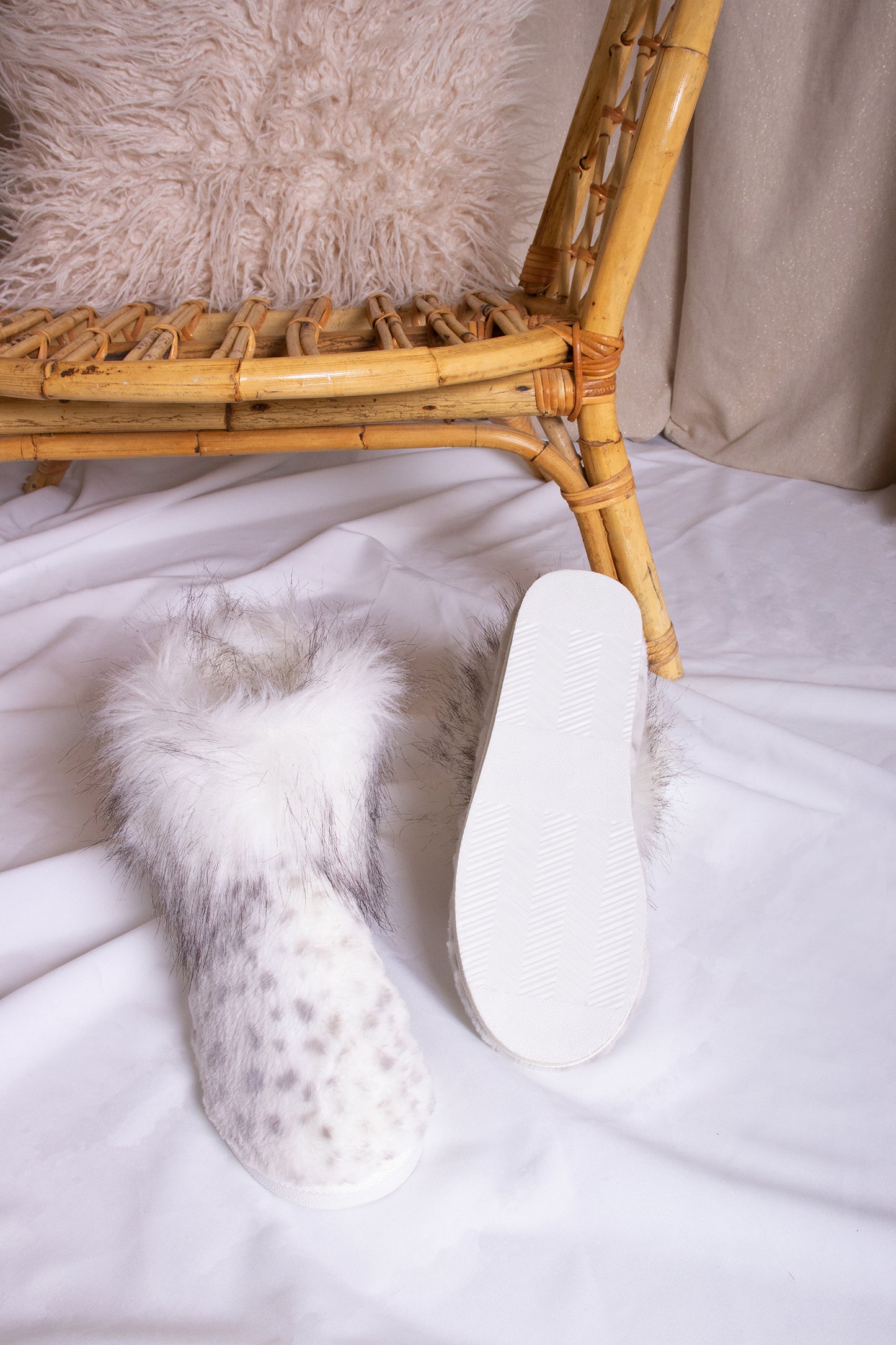 
                  
                    Fern women's ankle boot slippers in a snow leopard print with long pile faux fur cuff from Pretty You London
                  
                