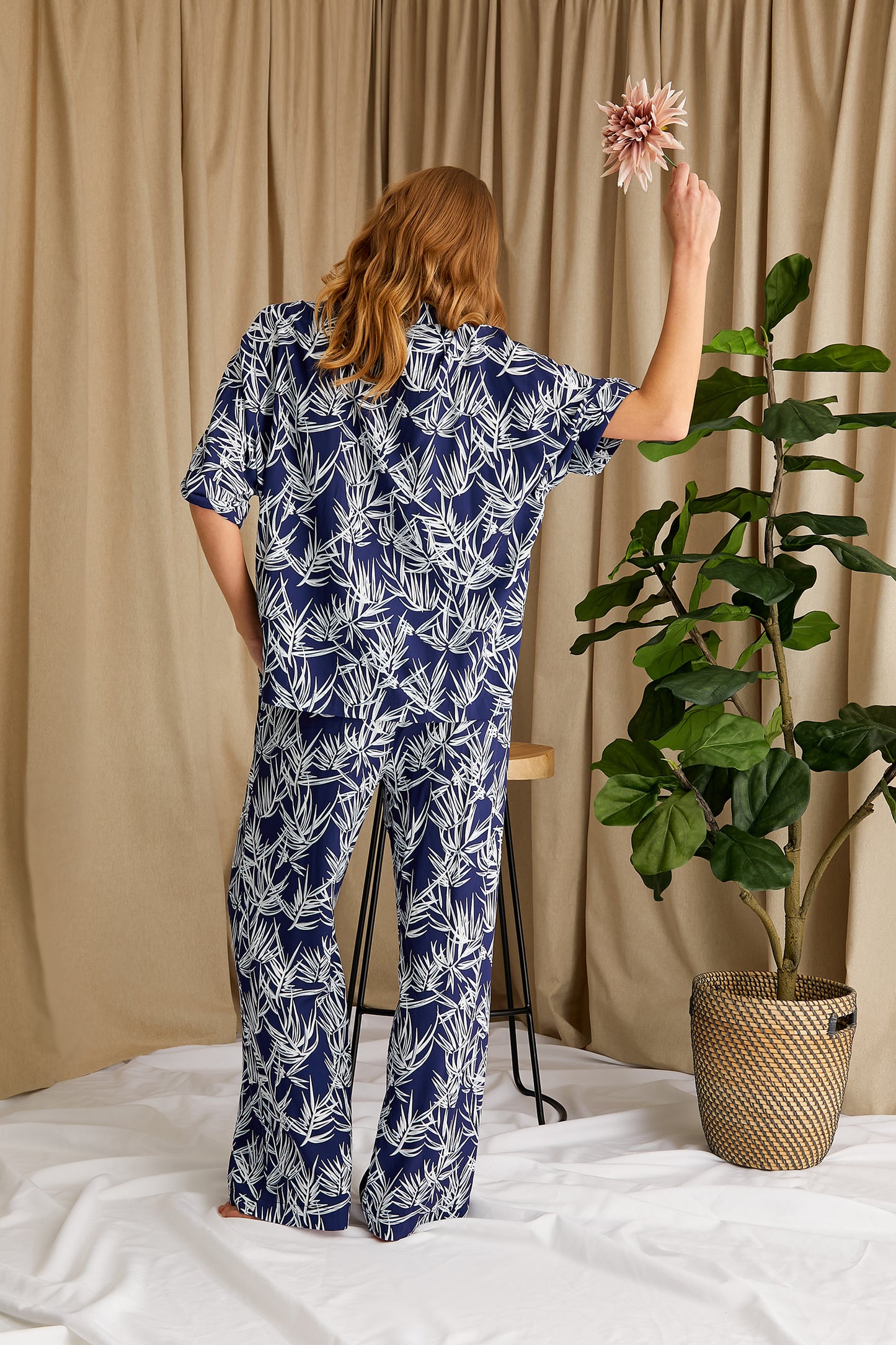 
                  
                    Women's Printed Studio Long Pyjama Set in Midnight Blue with tonal palm print from Pretty You London
                  
                